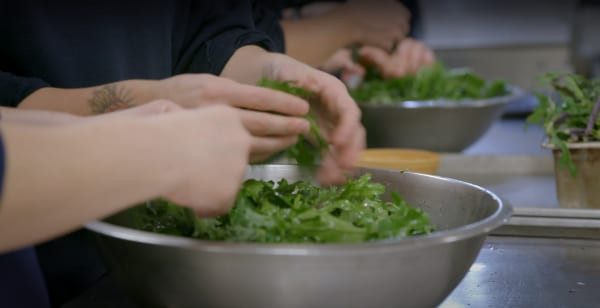 Oregon workers making healthy salads.
