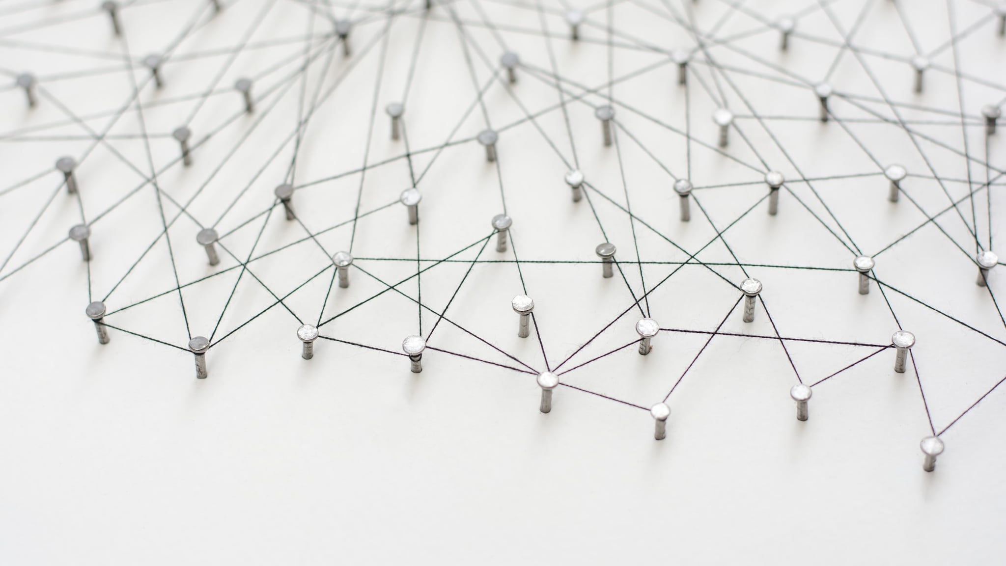 Pins connected by wires to symbolize a network
