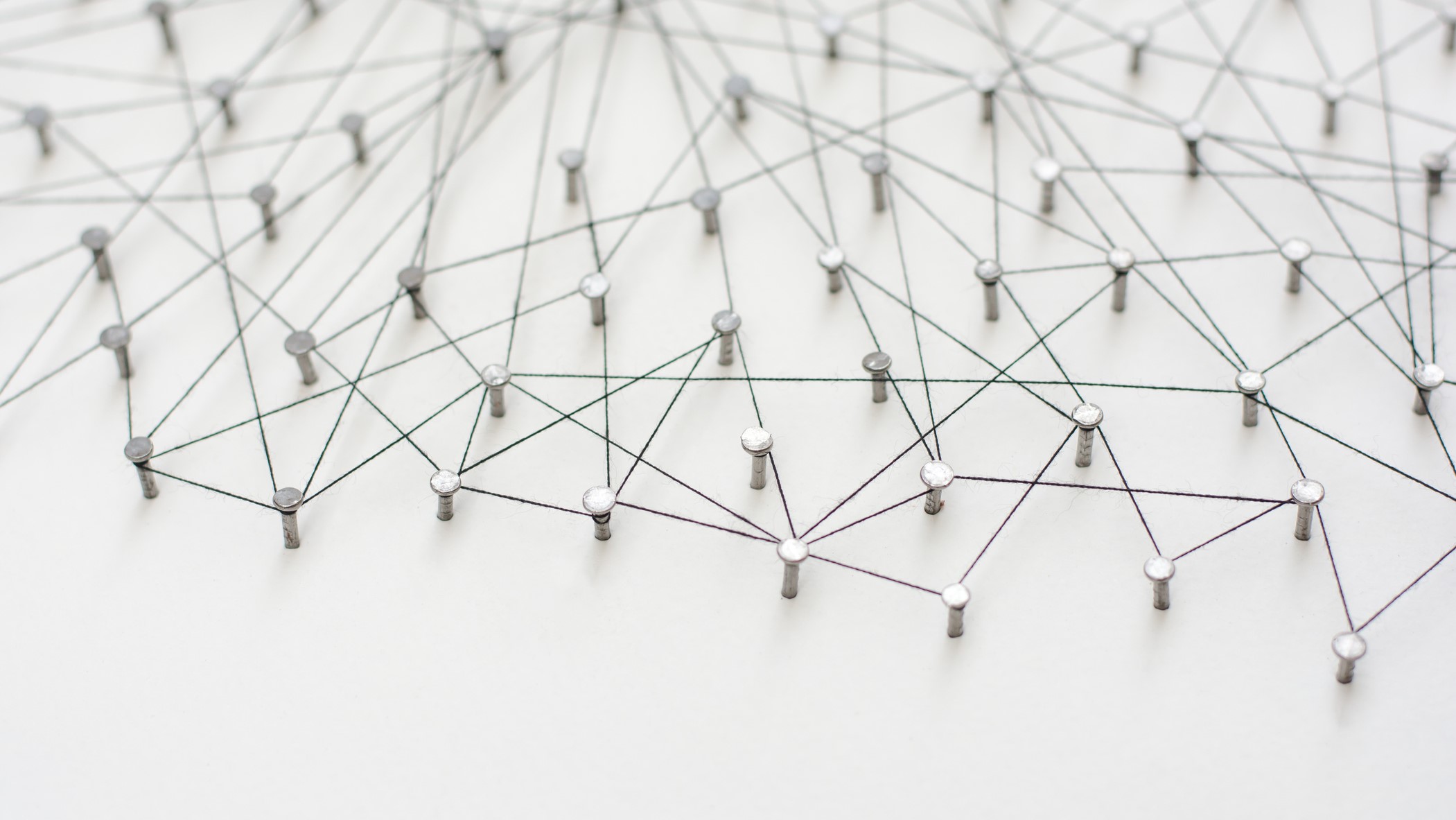 Pins connected by wires to symbolize a network