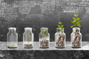 Saving money concept, change in jars