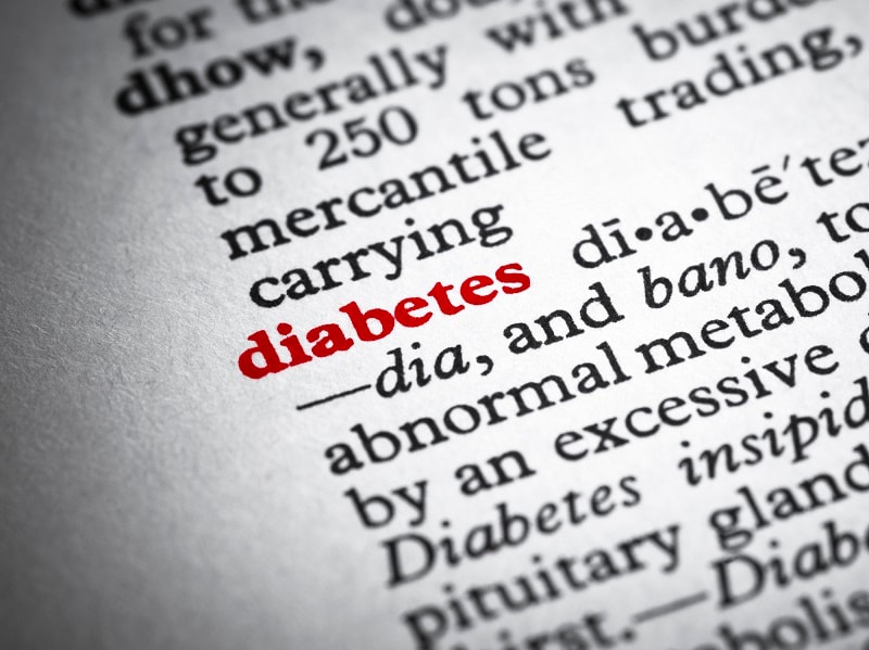 Closeup of dictionary page showing definition of diabetes
