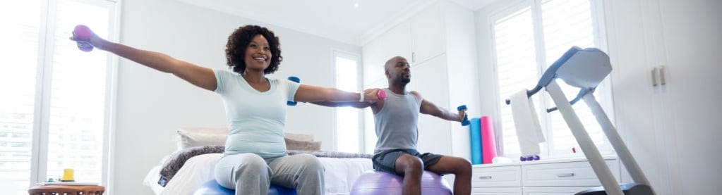 couple working out together at home