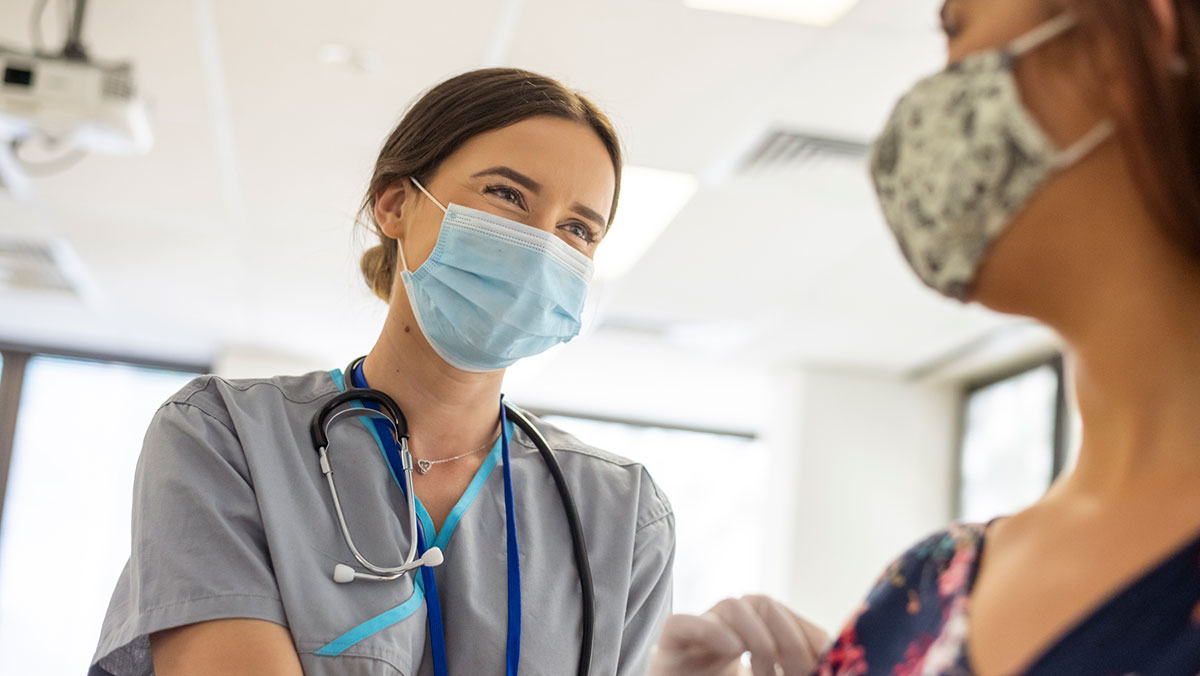 Health care professional interacting with a patient