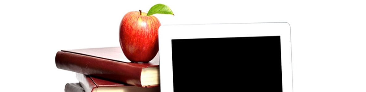Imagen de una manzana, libros y un ipad