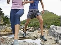couple running outside on a trail