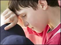 Photo of young boy with heat exhaustion.