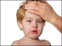 Photo of young boy not feeling well.