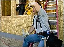 Photo of construction worker taking a break.