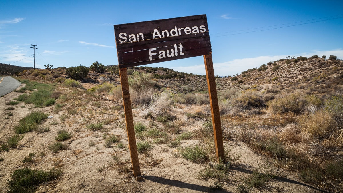 Sign in the desert marking the San Andreas Fault