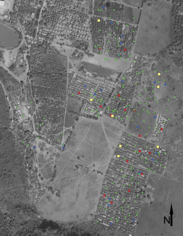 Locations of dwellings within camp for Hmong refugees with tuberculosis (TB), Thailand, February 2005. Symbols indicate dwellings of patients with the following types of TB: red triangles, multidrug-resistant; yellow squares, resistant to &gt;1 anti-TB medications but not MDR TB; blue circles, pansusceptible; green circles, unknown drug-susceptibility testing results.