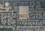 Thumbnail of Aerial photograph of a representative Bakersfield, California, neighborhood taken during August 2007. Red arrows indicate neglected or green swimming pools. Letters (F, G, H, J) are photographic reference points.