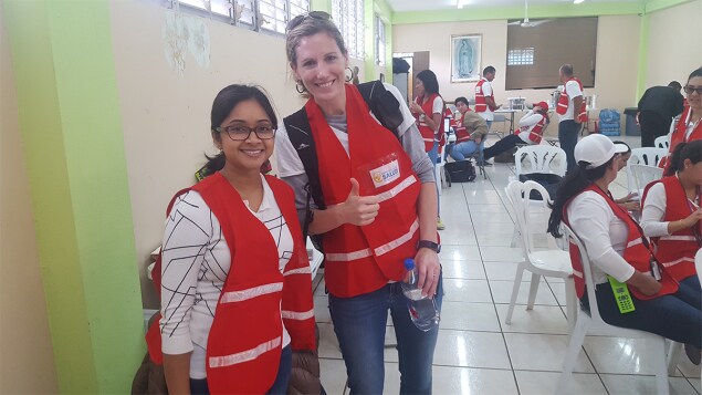 Amy Lavery, PhD, MSPH, EIS Class of 2017 (right) and Anindita Issa, MD, EIS Class of 2016, prepare to work in the field with a team of interviewers assisting with a CAPSER (community assessment for public health emergency response) in Puerto Rico a few months after hurricanes Irma and Maria.