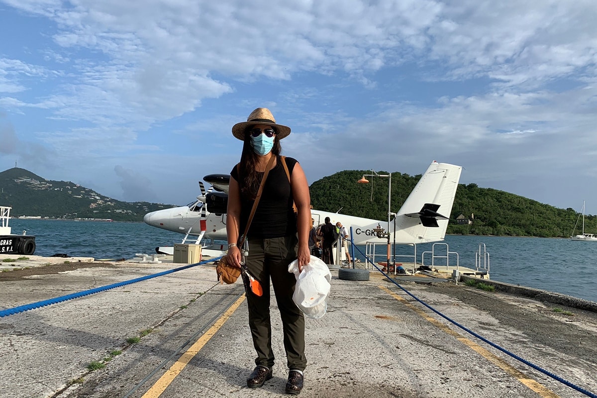 EIS Officer Valerie Mac masked and ready to fly to the U.S. Virgin Islands.
