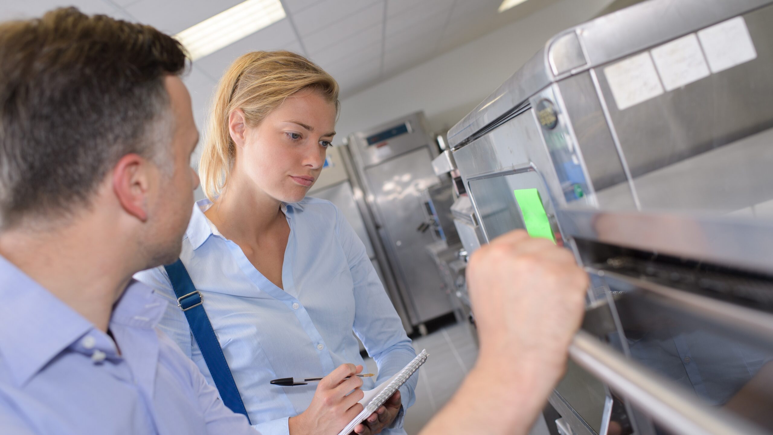 Inspectors in a restaurant kitchen