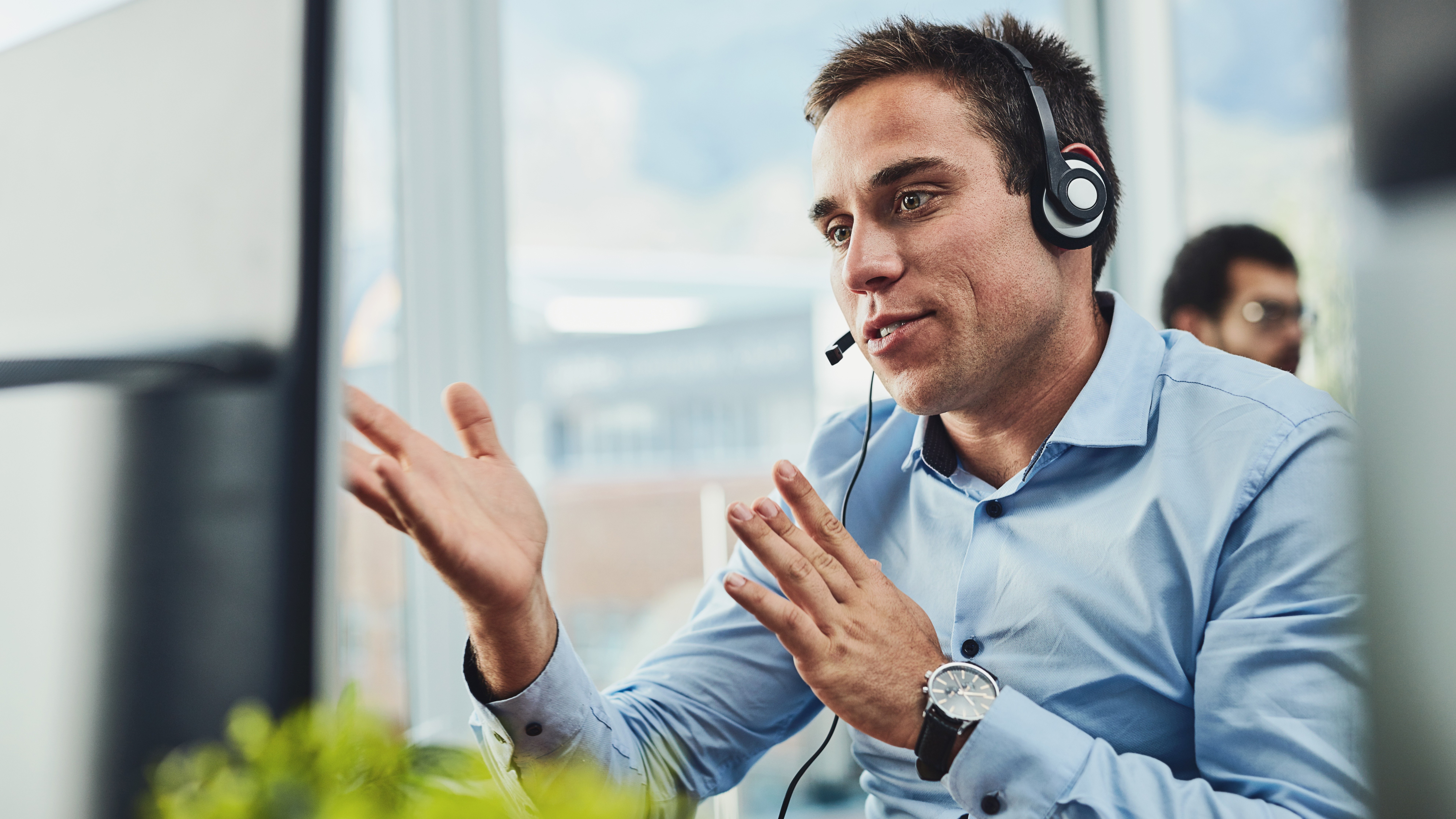 Professional wearing a headset and talking on the phone