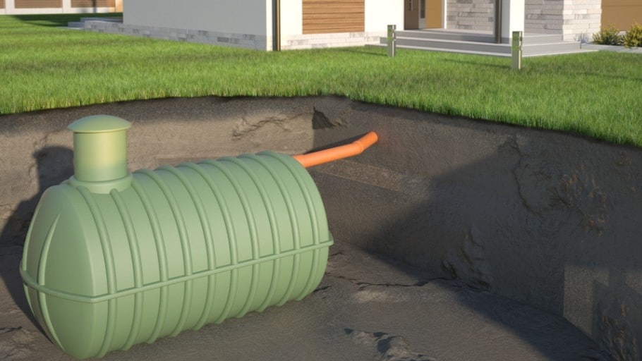Image of a septic system in front of a home.