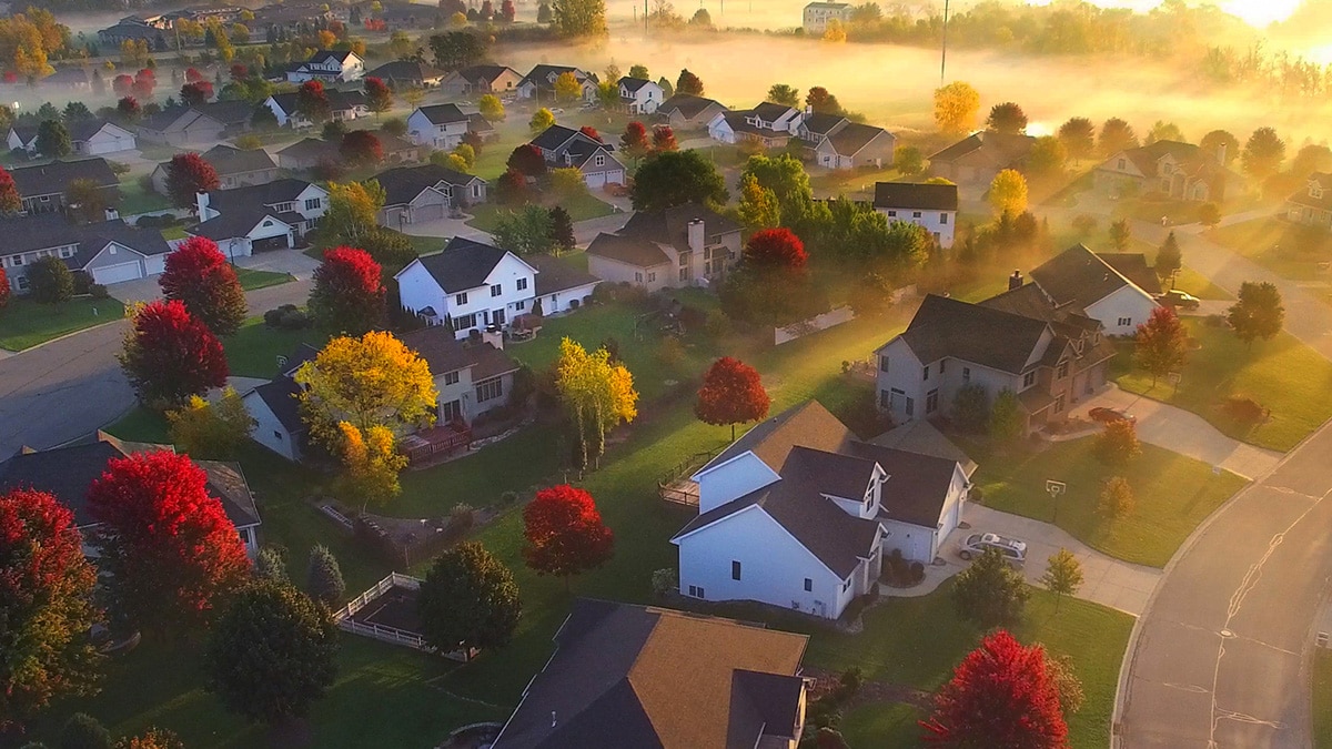 Aerial view of residential neighborhood at sunrise