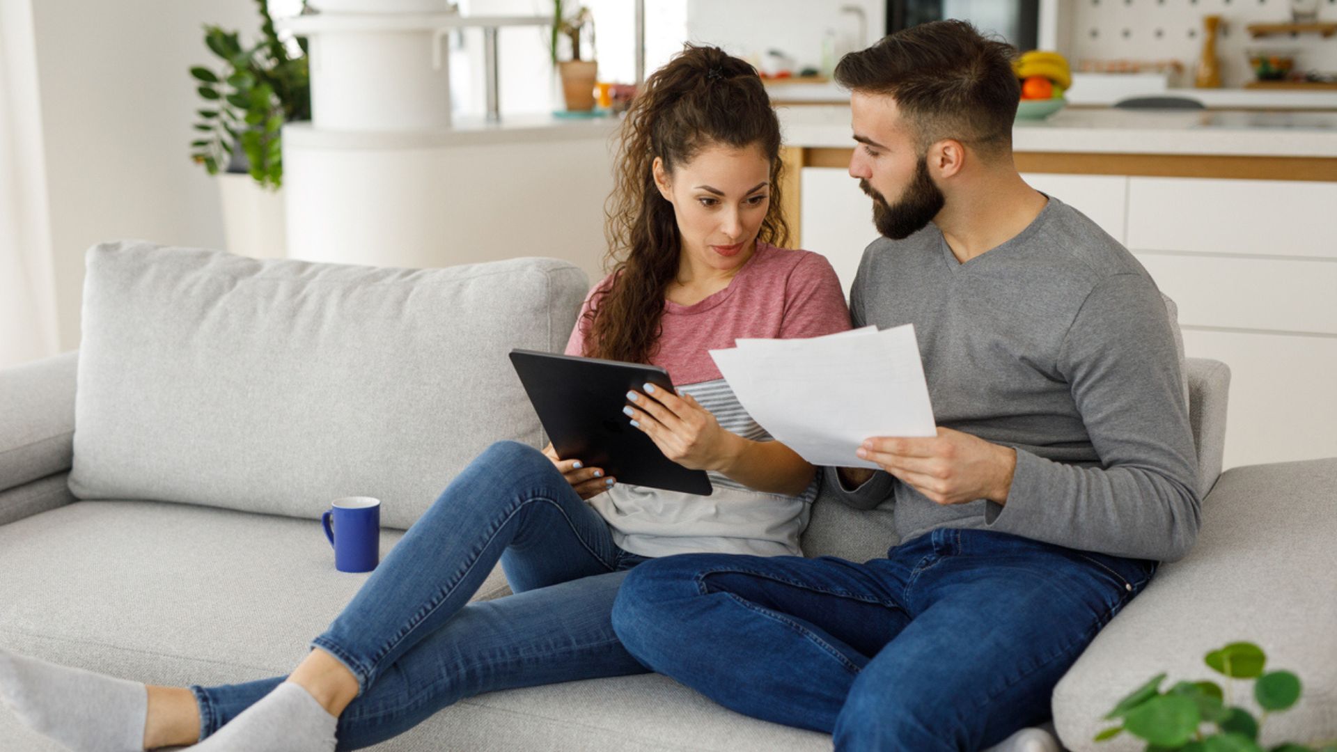 Couple reading informational materials