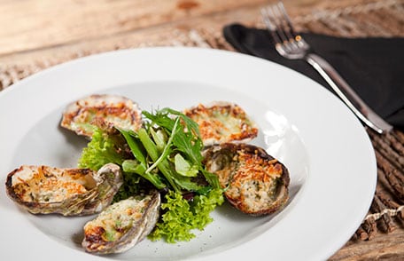 Plate of baked oysters