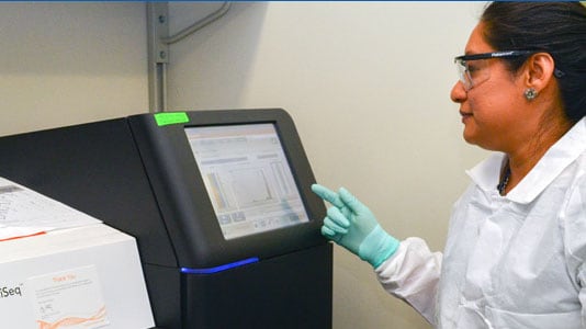 A Laboratory Leadership Service fellow operates a next generation sequencer instrument in a CDC streptococcus laboratory. (Georgia, 2017)