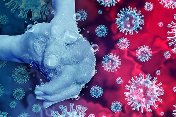 Hand being washed with a background of virus images