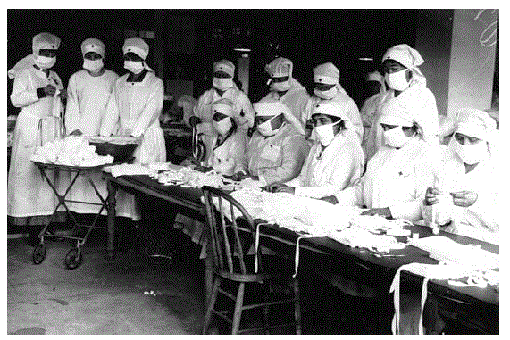 Nurses assembling flu masks