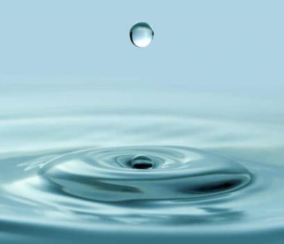 Drop of water with rippling waves