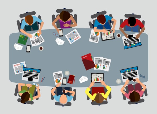 Illustration of eight people sitting together at a meeting room table. They are working on data reports using their laptops and tablets..