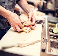 Image of person making sandwich
