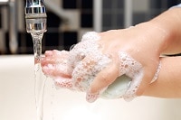 Image of hand washing.