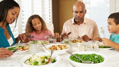 a family eating a healthy meal