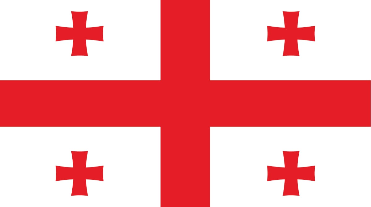 White background with a large red cross that extends to the edges of the flag.