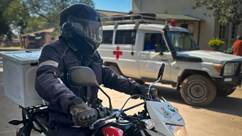 An IST rider delivers medical samples to a hospital in Zimbabwe
