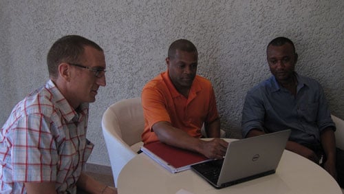 George Fergeson (BBC Media Action SL Country Director), Patrick Minor, CDC Sierra Leone DART liaison, and Musa Sangarie,  Program Manager (BBC Media Action)