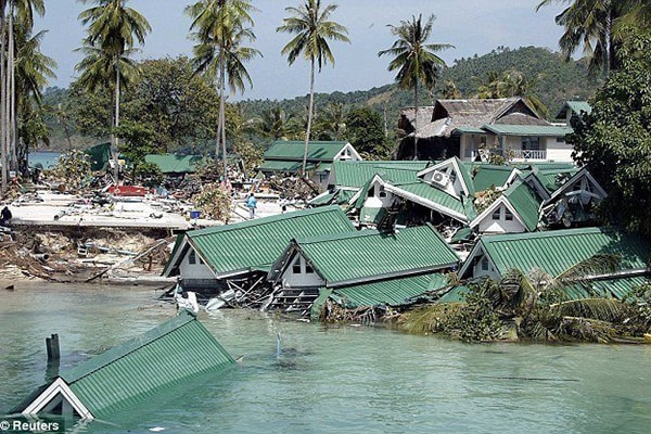 The Thailand FETP conducted disaster surveillance after the 2004 tsunami (submerged buildings shown).
