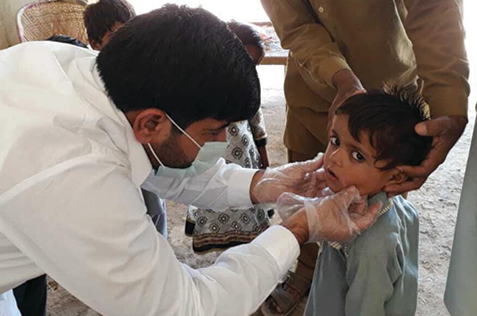 Investigating a mumps outbreak in Nasirabad, Pakistan. Photo: Zubair Ahmed
