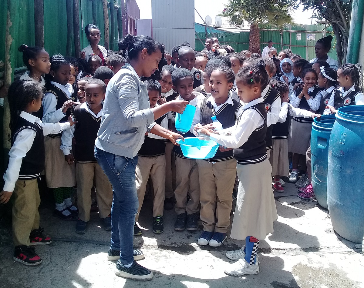 Demonstration of hand washing during outbreak investigation in Addis Ababa, Ethiopia. Photo: TEPHINET