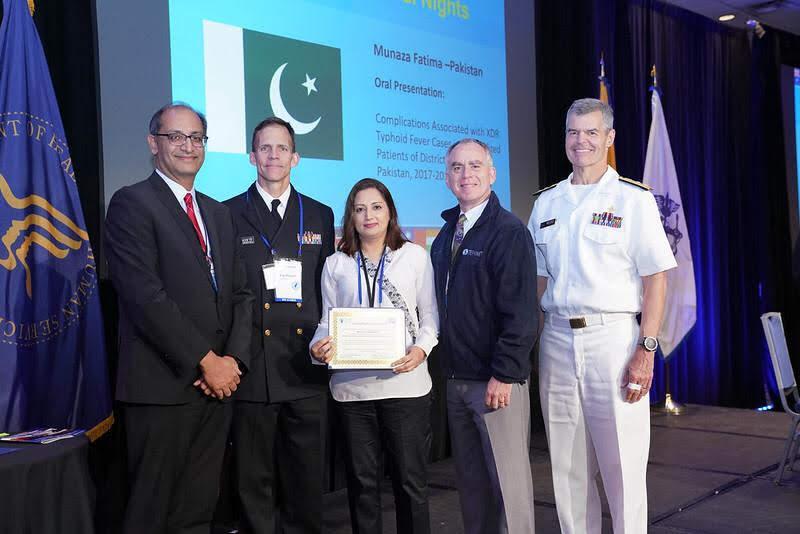 Dr. Munaza accepting the award for best oral presentation from an FETP resident. EIS International Nights, April 2019, Atlanta. (From left to right: Kashef Ijaz, Former DGHP Principal Deputy Director,  Kip Baggett, WIDB Branch Chief, Fatima Munaza, Pakistan-FELTP graduate, Patrick O’Carroll, Director of Health Systems Strengthening at the Task Force for Global Health, Stephen Redd, Deputy Director for Public Health Service and Implementation Science.