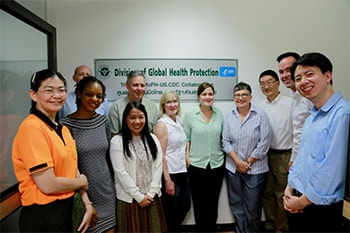 Dr. Toni Whistler, fourth from the right, with the Thailand lab staff at the surveillance lab at Nakhon Phanom Provincial Hospital.