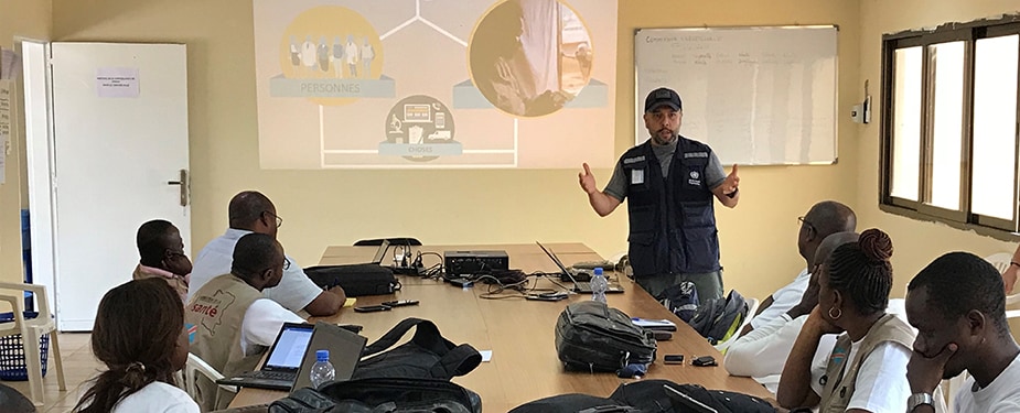 CDC Emergency Management Specialist Luis Hernandez conducts IMS and EOC training for organizations involved with the 2018 DRC Ebola response.