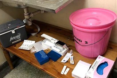 KENYA: Rapid diagnostic tests were set up for AFI laboratory testing (bottom right, next to the white box). Photo: Naila Smith
