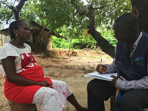 Disease detective Victor Inhane conducts Zika case investigation in a Guinea-Bissau community.