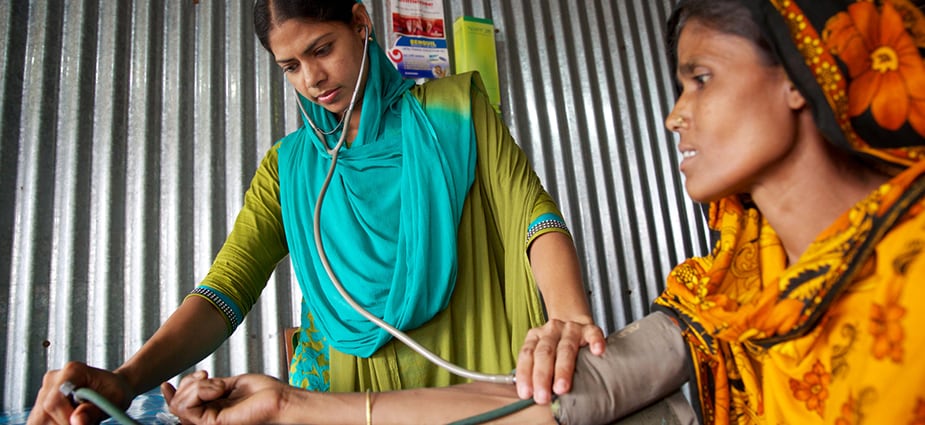 A woman undergoes a preventative screening in Bangladesh. Effective noncommunicable disease interventions can prevent premature deaths and strengthen global economies.