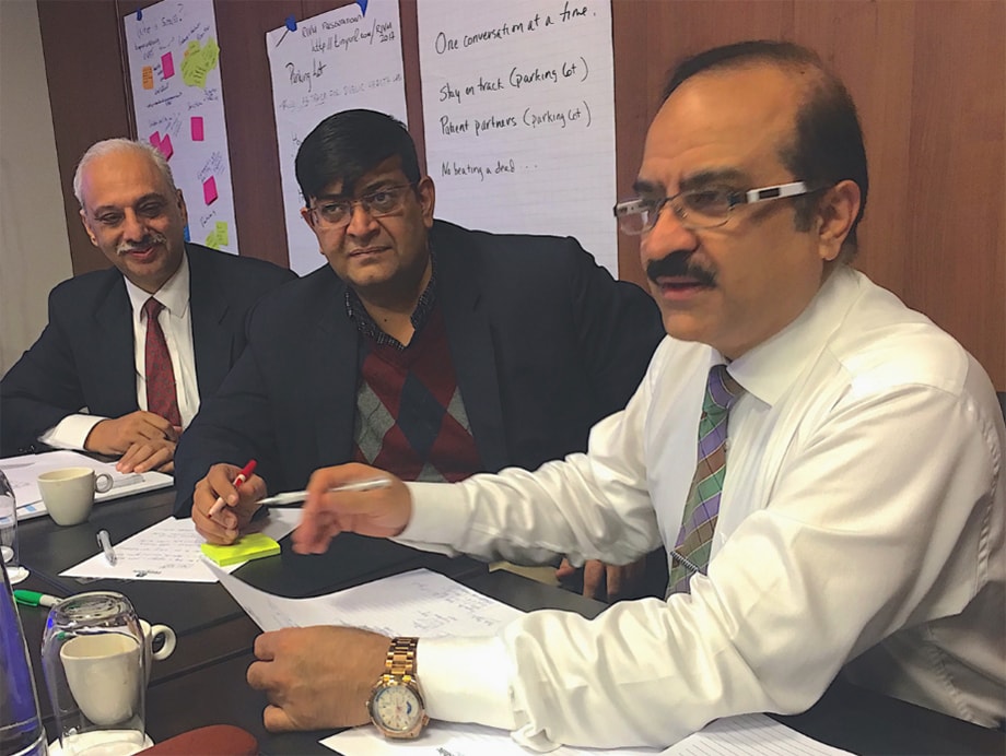 In 2017, Pakistan delegation members share their vision for the new Pakistan NPHI. Pictured, L to R: Brigadier Dr. Aamer Ikram, Executive Director at Pakistan NIH; Dr. Muhammad Salman, Head of Virology Department at Pakistan NIH; and Dr. Faheem Tahir, Chief-Public Health Laboratory Division at Pakistan NIH. Photo: Sue Binder/IANPHI 