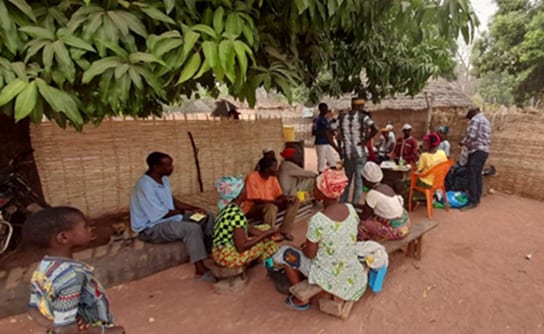 Guinea FETP residents are leading discussions with community members on the COVID-19 pandemic in Youkounkoun in 2021