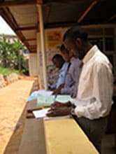 Ugandan trainees take a study break.