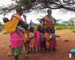 In Kenya, Samburu mothers bring their children for measles vaccination.