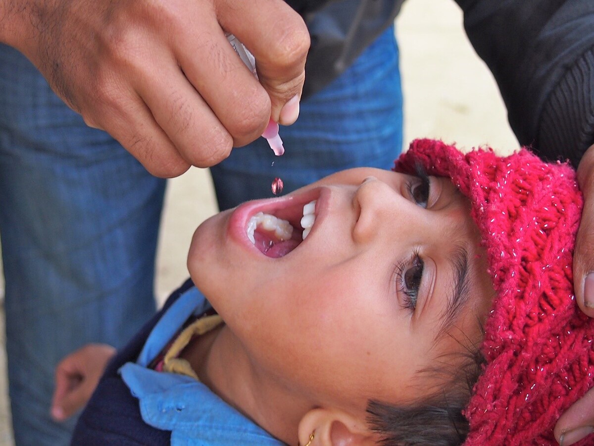 A Nepalese child receives his polio vaccine during an immunization campaign.