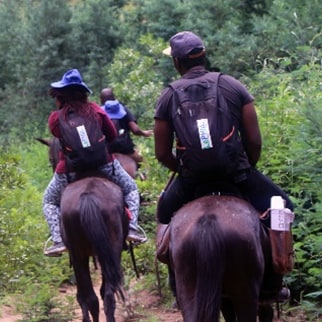 Population-based HIV Impact Assessments (PHIA) Survey team in Lesotho travels on horseback to gather critical information on the HIV epidemic