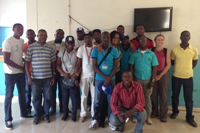 CDC’s Dr. Alaine Knipes and Dr. Carl Fayette of IMA World Health (in yellow) with survey teams, preparing to head into the field for the coverage survey in Port-au-Prince.  
